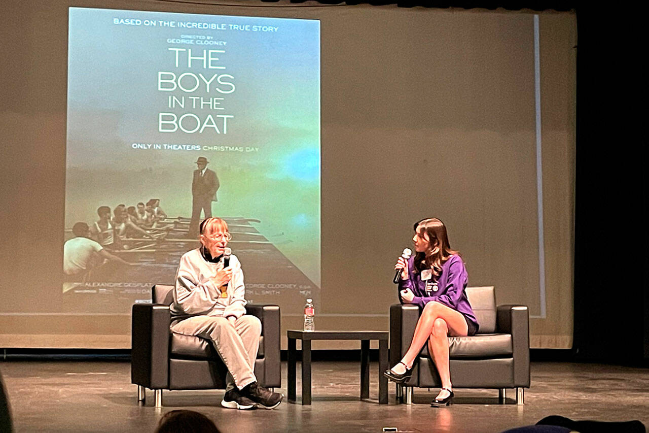 Sequim Gazette photo by Matthew Nash
Judy Willman, the daughter of Joe Rantz, is interviewed by Danika Chen, a 2023 Sequim graduate, in the Sequim High School Auditorium on Dec. 8 about elements of “The Boys in the Boat” film and how her father is portrayed. Willman said her dad would not want attention but would be okay with it if it supported causes such as restoring the historic ASUW Shell House and building a homeless youth house in Sequim.