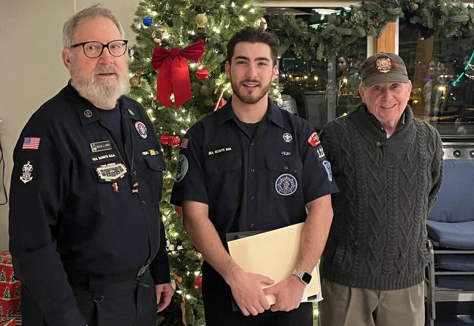 Photo courtesy of VFW Post 4760
Ozzy Minard, Eagle Scout and Sea Scout Quartermaster (center), receives awards from Doug Hoople, Washington State VFW Scout Leader (left) and Jack Flanagan, VFW Post 4760 Scout coordinator.