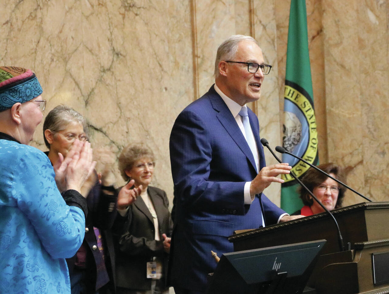 Photo by Aspen Anderson/Washington State Journal / Entering his final year in office, Gov. Jay Inslee calls for action on several fronts in his annual State of the State address to a joint session of the state Legislature.