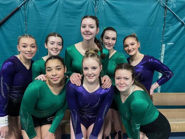Photo courtesy of Rachel Sharp 
Sequim-PortAngeles gymnasts celebrate their Senior Night at their final regular meet of the season on Jan. 27 in Port Angeles. Pictured are (back row, from left), Susannah Sharp, Faith Carr, Waverly Mead, Maddie Adams and Madi Ripley, with (front row, from left) Shavari Epps,Lucy Spelker and Ryah Deleon.