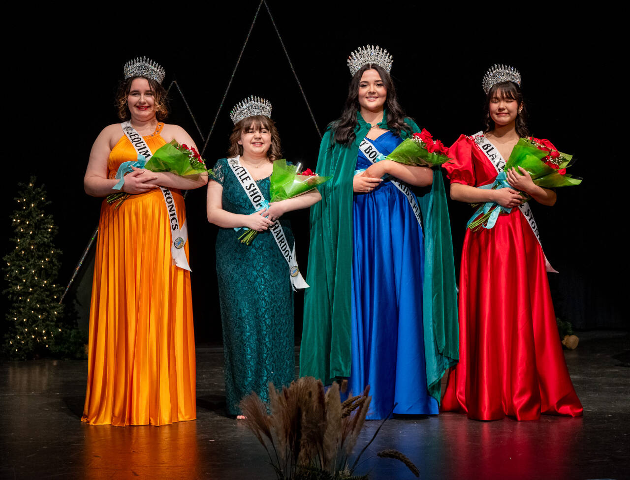 Photo by Emily Matthiessen 
Judges name the 2024 Sequim Irrigation Festival court on Feb. 24 at Sequim High School. Pictured, from left, are princesses Ashlynn Northaven and Sophia Treece, queen Ariya Goettling and princess Kailah Blake.