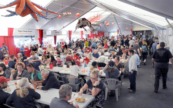 Crowds pack the main dining tent on Saturday at the Dungeness Crab and Seafood festival near the Port Angeles waterfront. (There was plenty of crab to go around, aid Scott Nagel, executive director of the festival. "It was crowded and wonderful," he said. Keith Thorpe/Peninsula Daily News)