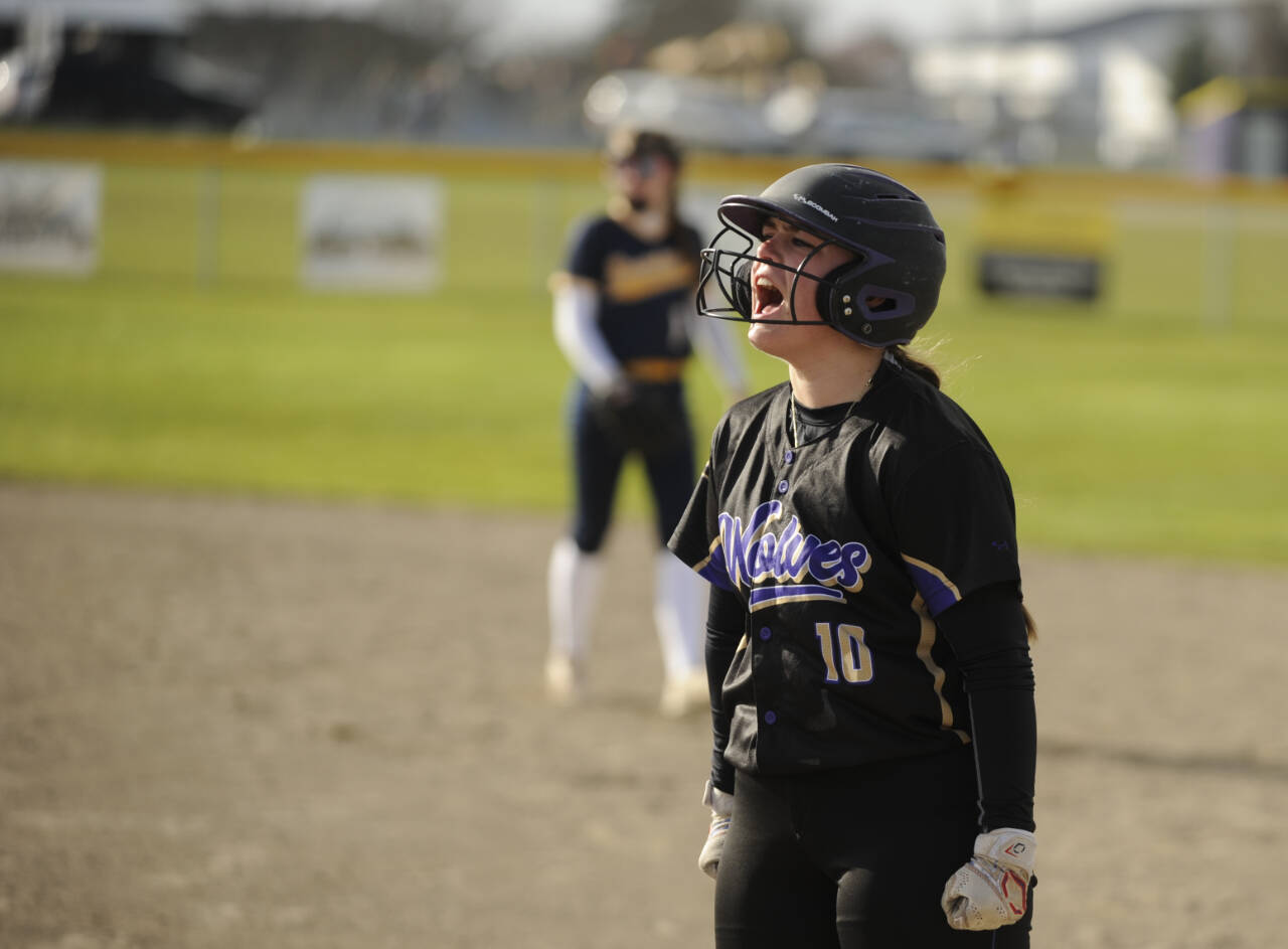 Sequim Gazette photo by Michael Dashiell / Sequims Mikki Green lets out a howl after driving in a run in the Wolves 7-3 win over visiting Forks on March 12.