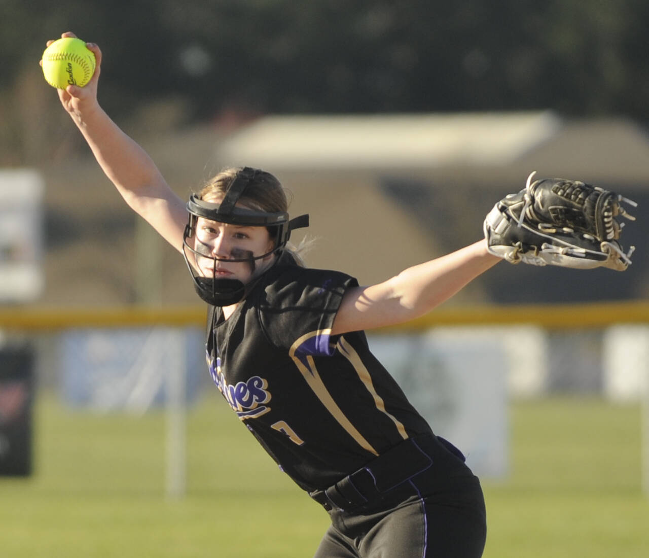 Sequim Gazette photo by Michael Dashiell
Sequim’s Rylin Whitehead pitches in relief as the Wolves host Bainbridge on March 19. The visiting Spartans edged the Wolves 15-13 in a back-and-forth league contest.