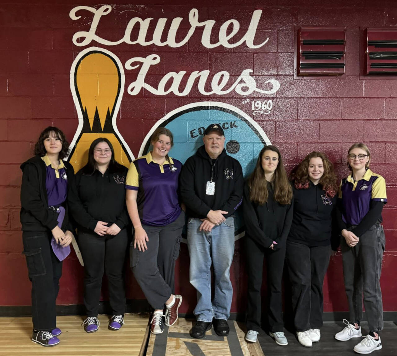 Photo courtesy of Sequim High Wolves Bowling / Sequim High’s bowling team earned a class 2A academic state championship for the 2023-24 season. Pictured are, from left, Victoria Nava, Morgan Kayser, Skylar Kryzworz, head coach Randy Perry, Nikoline Updike, Cooper Hiatt and Kimberly Heintz.