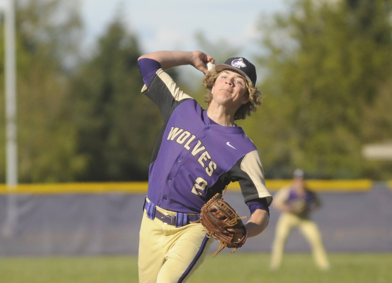 Sequim Gazette photo by Michael Dashiell
Sequim’s Zeke Schmadeke pitches in the fourth inning as the Wolves host Kingston on April 30.