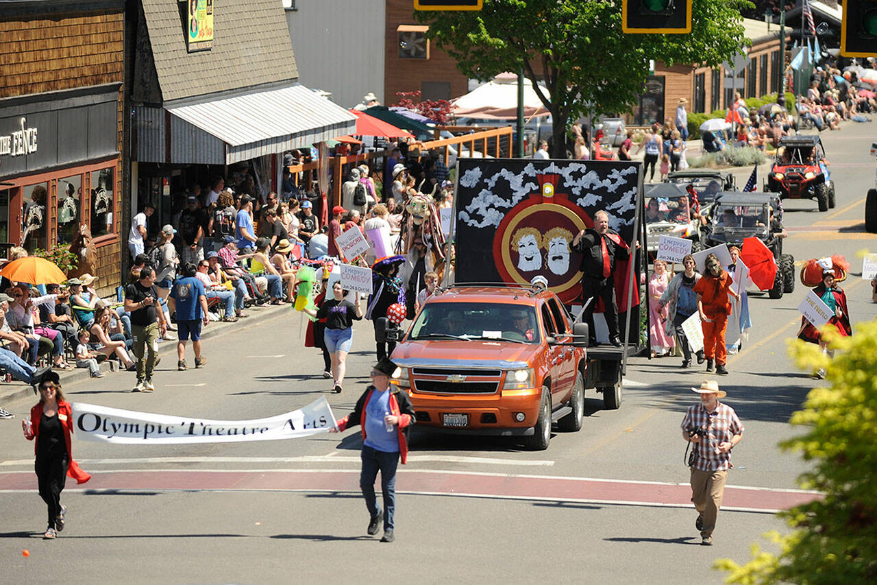 Sequim Gazette file photo by Michael Dashiell
Thespians and crews from Olympic Theatre Arts productions greet attendees of the Sequim Irrigation Festival Grand Parade last year. The event takes place at noon on Saturday, May 11 along Washington Street.