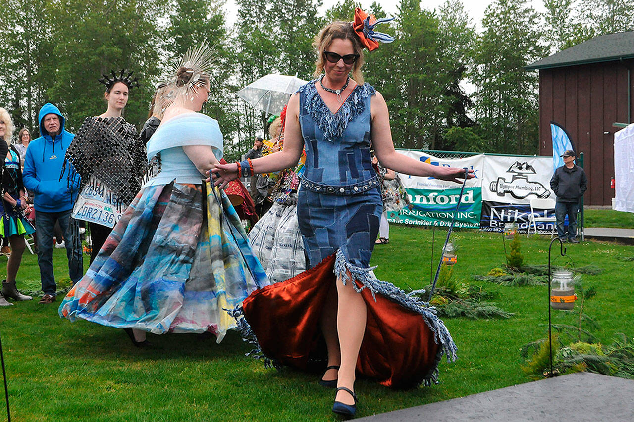 Sequim Gazette photos by Matthew Nash
Sonja Hess-Ranelius models the winning look “My Scraps of Denim Dream” during the Trashion Show on May 4. Cherry Bibler designed the look and said it was a collaborative effort as they started in February on the look. Bibler said she used jean scraps for the look, and Hess-Ranelius suggested orange curtain for underneath.