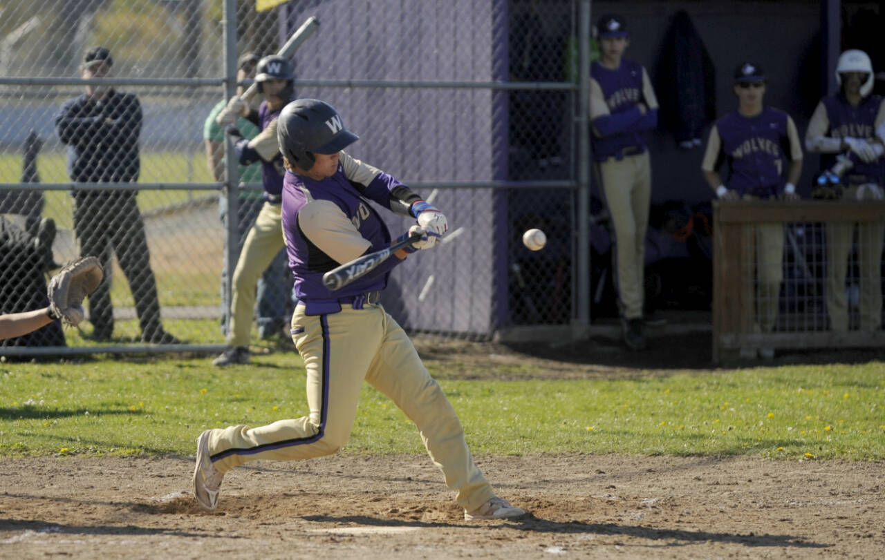 Sequim Gazette FILE photo by Michael Dashiell
Sequim’s Lincoln Bear rips a single in the bottom of the fourth inning as the Wolves host Kingston on April 30. Kingston ended Sequim’s postseason run Saturday in a winner-to-state, loser-out district tourney game.