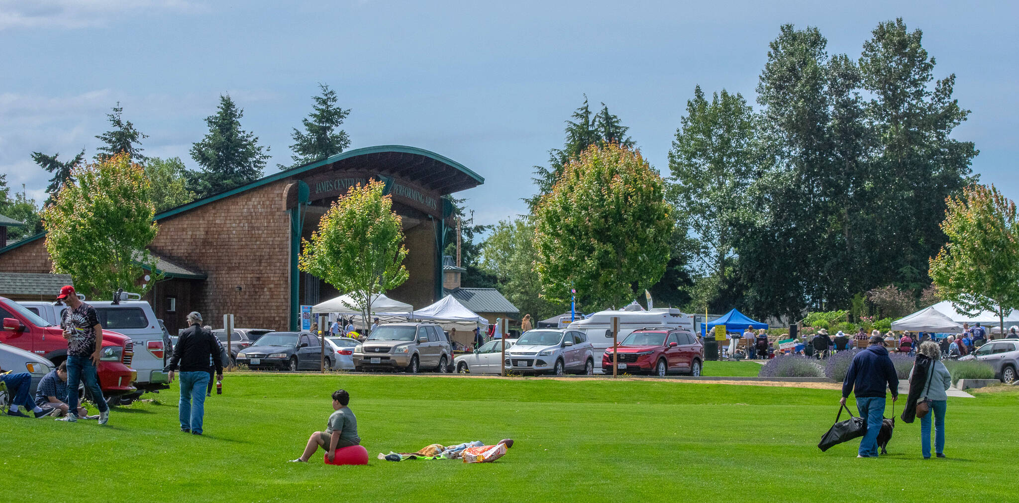 Sequim Gazette photo by Emily Matthiessen/ At times during Sequim’s Independence Day celebration the parking lot at Carrie Blake Community Park was full of vehicles, with more parked in the surrounding neighborhood, but there was plenty of room for everyone to sit as close or as far apart as they chose.