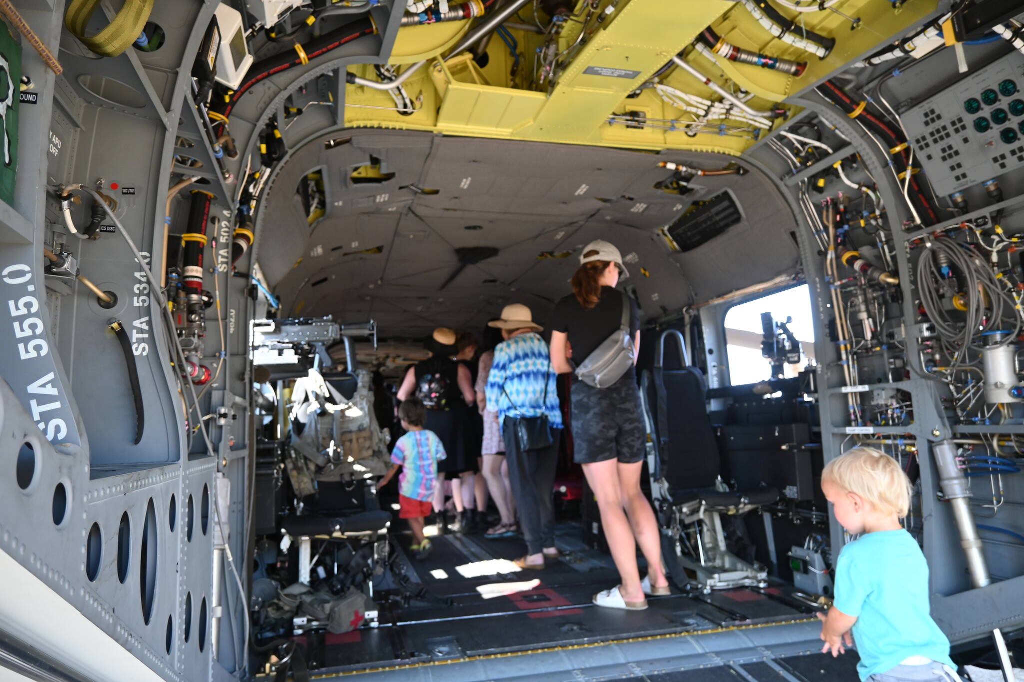 Sequim Gazette file photo
Attendees of the 2024 Unity of Effort event in Sequim get a look inside an MH-47G Chinook, a U.S. Army twin-engined, tandem rotor helicopter. This year’s free event, hosted by Security Services Northwest, takes place Saturday, Aug. 9.
