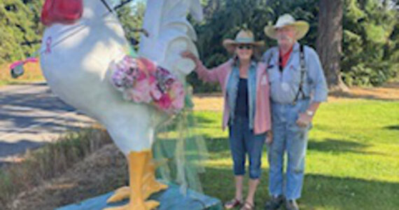 Photo courtesy of Janet Real/
This large rooster at hole #2, courtesy of Dave and Trisha Bekkevar (pictured), will welcome participants in Saturday’s annual “Drive for the Cure” fundraiser sponsored by the Sunland Women’s Golf Association.