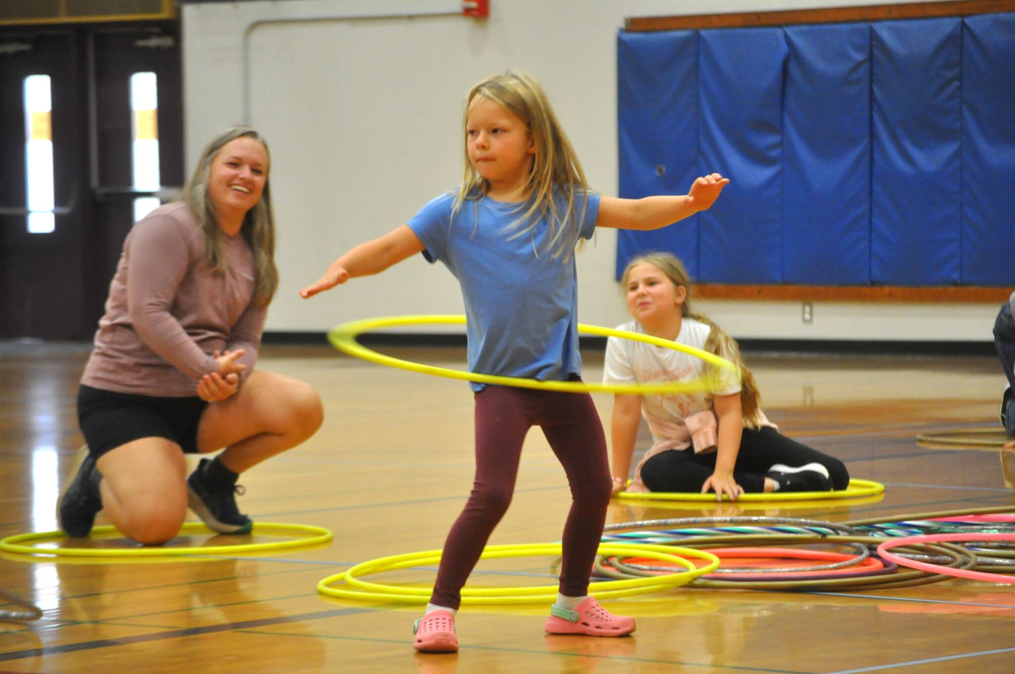 Sequim Gazette photos by Matthew Nash
Dorothy Gale of Camano Island focuses as she hula hoops at the Sequim Library’s Summer Reading Program on Aug. 14. She was visiting her grandmother in Sequim with her family.