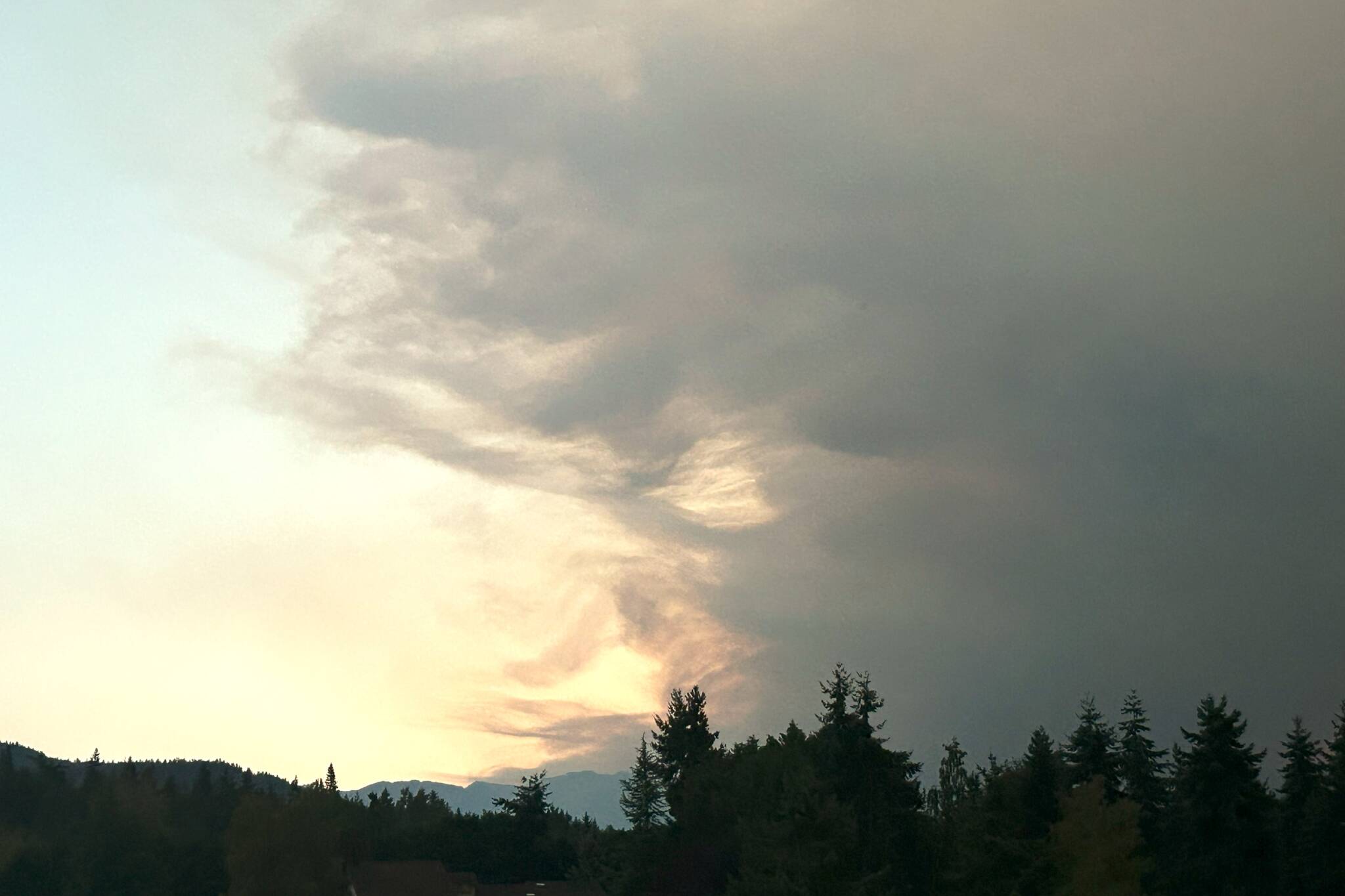 Sequim Gazette photo by Matthew Nash/ Smoke fills the night sky in Sequim on Sept. 16 from the Bear Gulch Fire.