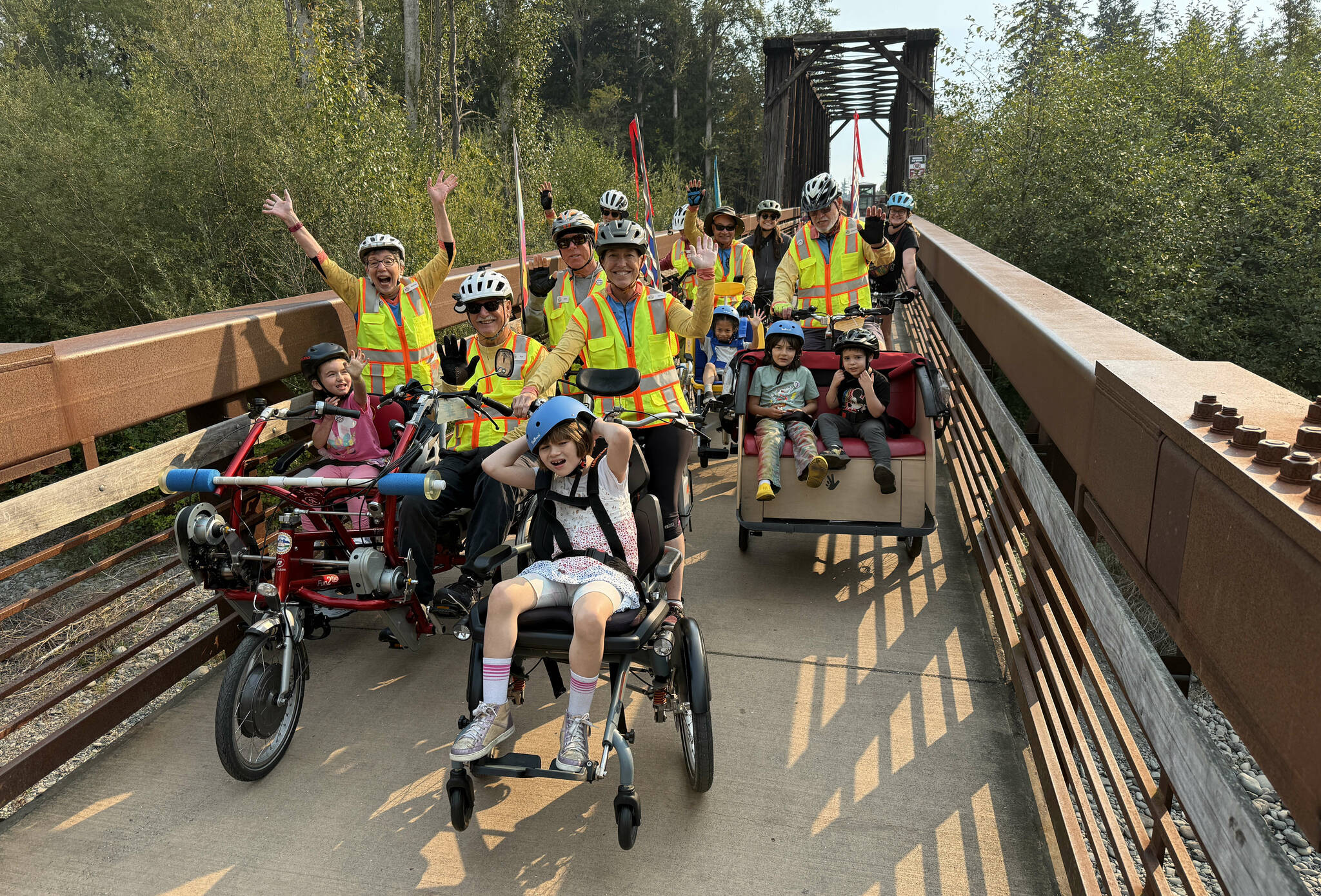 Ten students from Salish Coast Elementary School in Port Townsend were treated by the Sequim Wheelers to a bicycle ride along the Olympic Discovery Trail on Wednesday, Sept. 17. Accompanied by teachers, aides and parents, the group rode west from the Dungeness River Nature Center, sharing laughs along the way. The nonprofit is concluding its 2025 season, with 70 volunteers having provided 109 rides to 404 passengers.