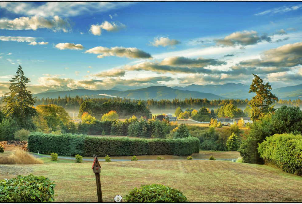 The last vistages of a gossamer fog can be seen on this landscape in Sequim on Tuesday, Sept. 30 - the final morning of September, and eight days after summer gave way to autumn.