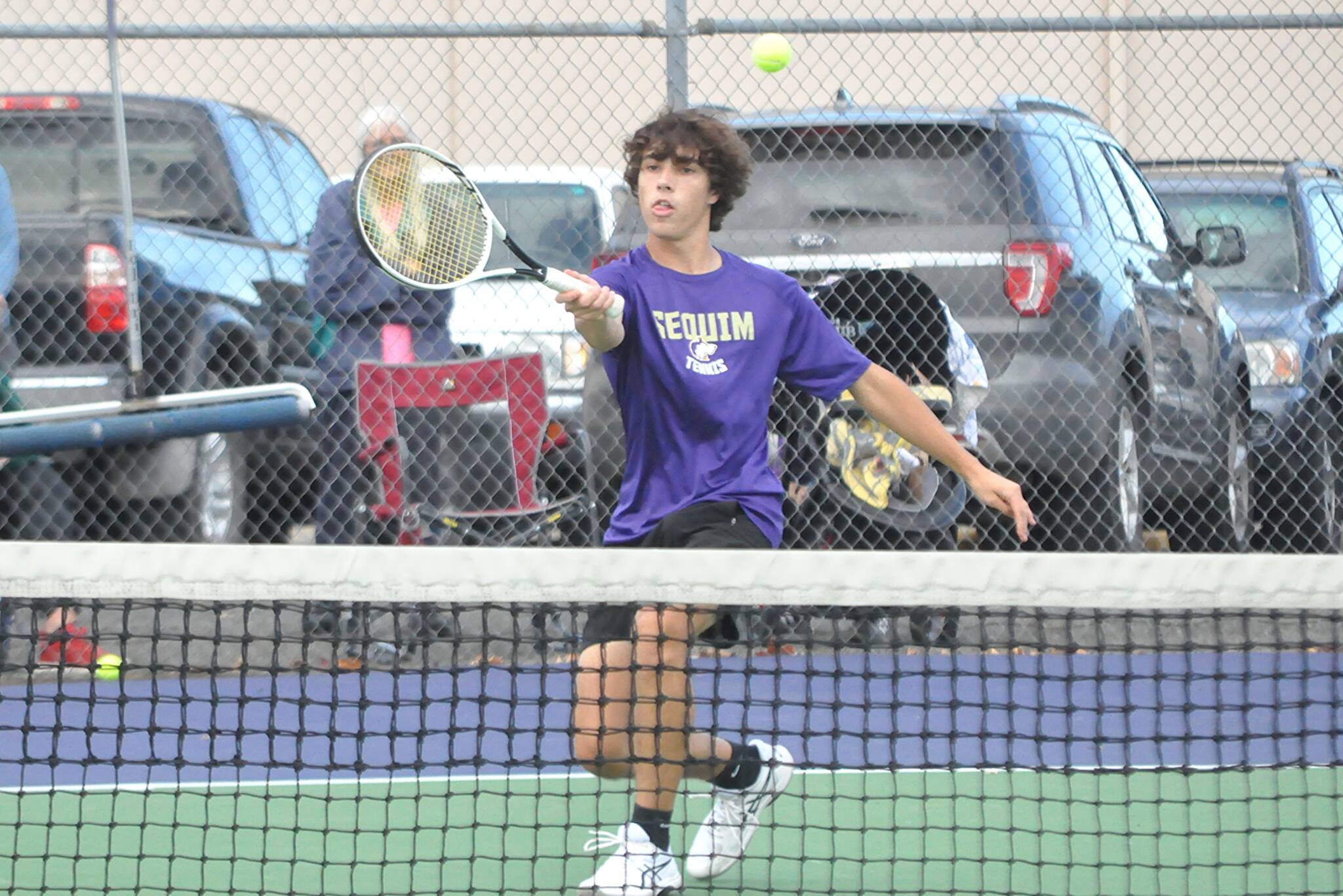 Sequim Gazette photo by Matthew Nash
Josh Loucks, Sequim’s No. 2 tennis singles player, won his match against North Mason to help the Wolves win 6-1.