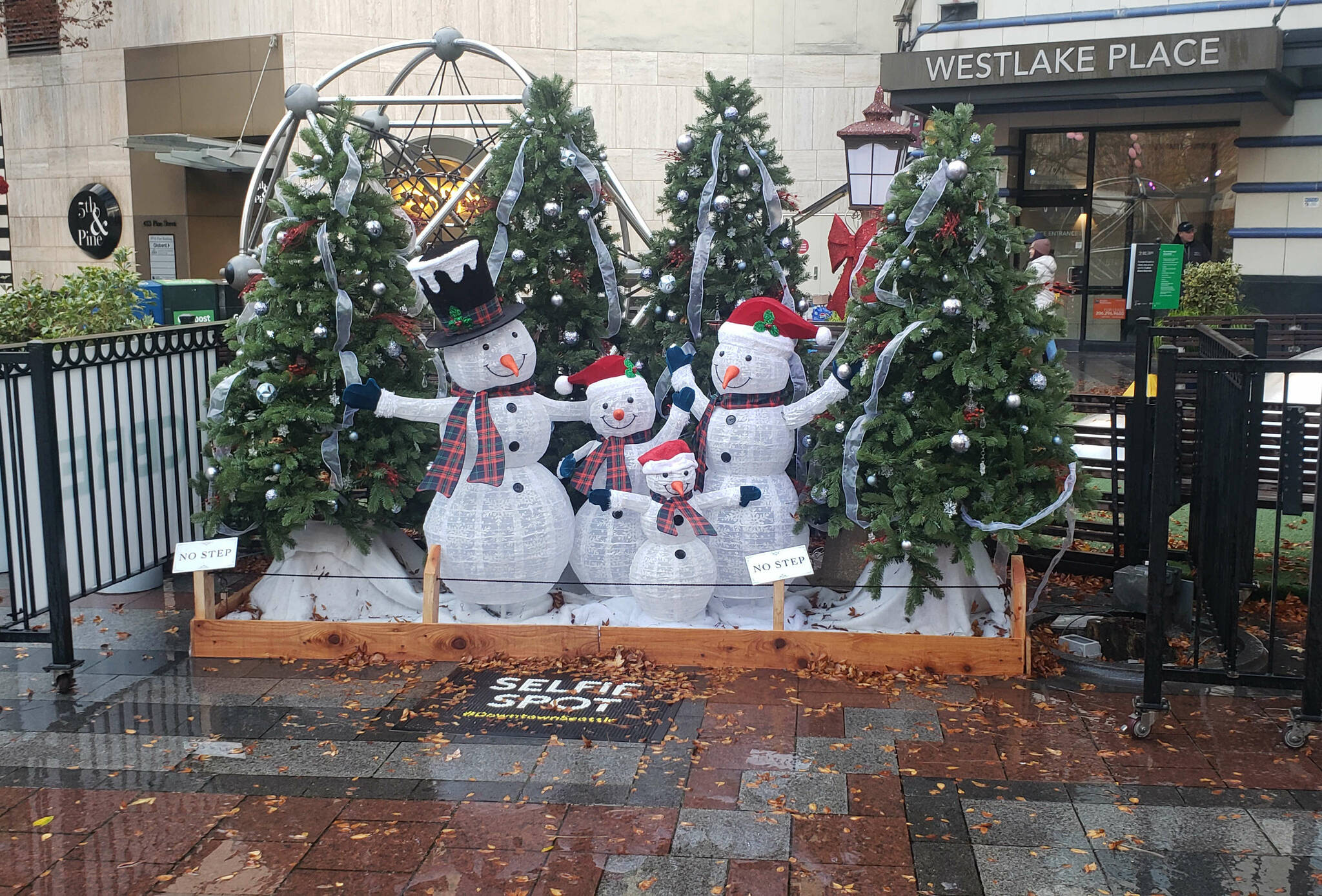 Photo courtesy of Leah Leach/ A snowman family with decorated trees is among the set pieces from Westlake Park in Seattle that will be part of the Opening Ceremonies for the Olympic Medical Center Foundation’s Festival of Trees over Thanksgiving Weekend. Tickets are now on sale.