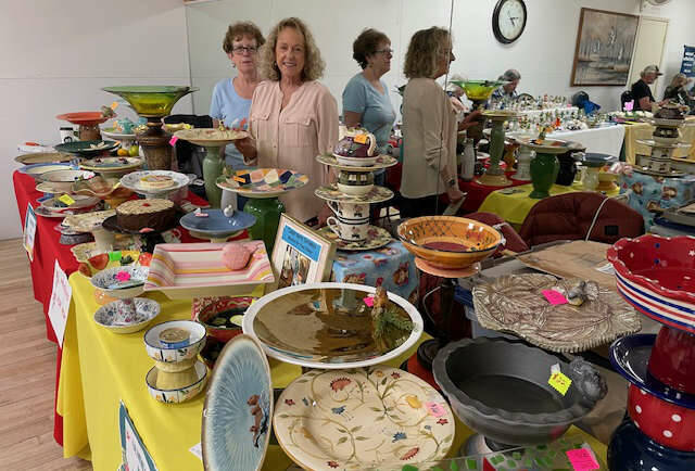 Photo courtesy Reba Renner
There’s always quite a spread at Barbara Sorensen’s Topsy Turvy table at the annual Holiday Bazaar at the Shipley Center. Sorensen, right, is pictured here with her sister and helper, Mary Pat Smith.
