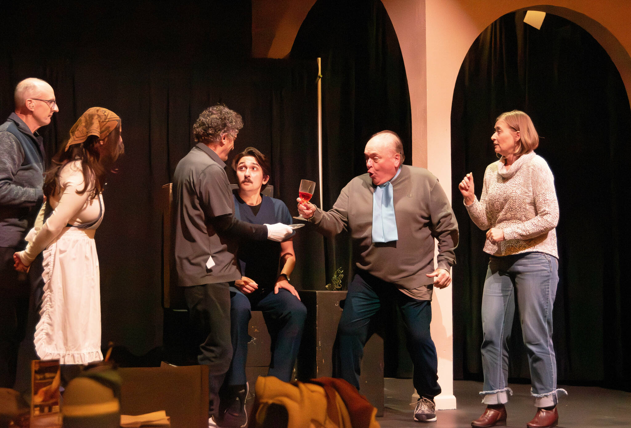 Photo by Monica Berkseth
Director Bill Stone, far left, observes as the full cast of “Death Perception,” written by John Painter, rehearses the week before the launch of New Works Showcase at Olympic Theatre Arts. The cast is, from left, Veronica Konecnik, Jory Kahn, Simon Close, Joel Swenning and Rebecca Maberry.