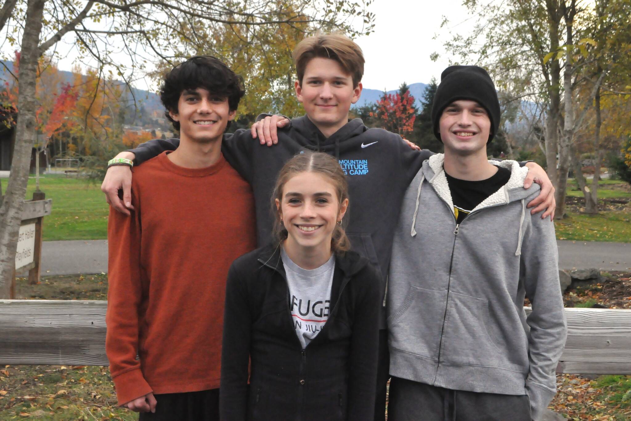 Sequim Gazette photo by Matthew Nash
Sequim runners, from left, Reid Randall (alternate), Adrian Osborne, Gavin Tupper, and Emily Bair, in front, qualified for the 2A state meet in Pasco. Bair, a freshman, led all Olympic Peninsula girl runners with a 60th place finish in 20:57.9. In the boys race, Osborne finished 81st (17:35.5), and Tupper was 127th (18:14.8).