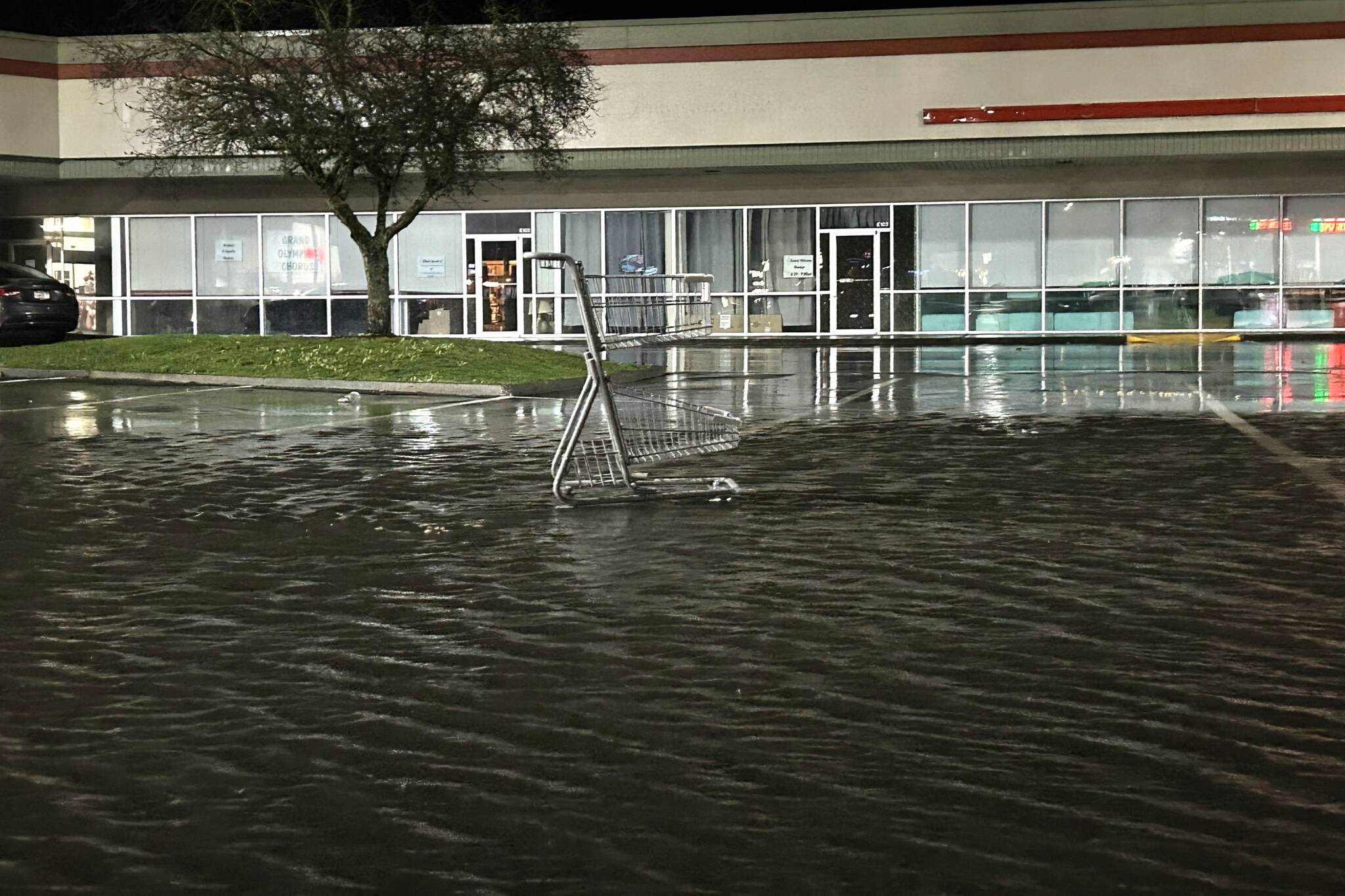 Sequim Gazette photo by Matthew Nash
The parking lot by The Dollar Tree and QFC saw a few inches of water after heavy rains early last week, but Sequim saw no widespread flooding from the first atmospheric river that hit the Pacific Northwest.