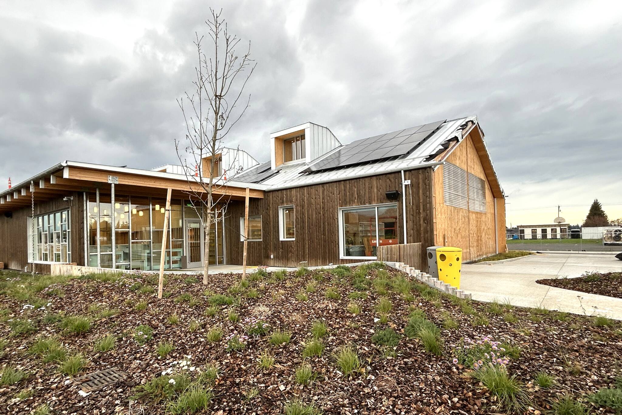 Sequim Gazette photo by Matthew Nash
An intricate window and frame was delivered on Dec. 22 that will lead to construction on the Sequim Librarys east wall to be completed.