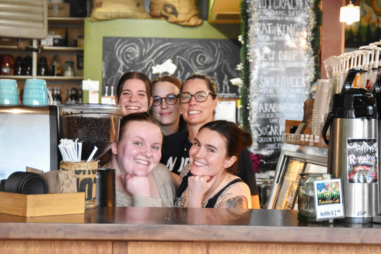 Sequim Gazette photo by Monica Berkseth
Business owner Dominique Hall, top right, credits her staff for helping her juggle three businesses - Rainshadow Cafe and Spoonbar Sweets in downtown Sequim, and Rainshadow on 5th Avenue in Port Angeles. Shown here with Hall at the Sequim Rainshadow service counter are, top row from left, Sarah Cameron and Sydney Rivers, and, bottom row from left, Grace Roening and Maizie Reidel.