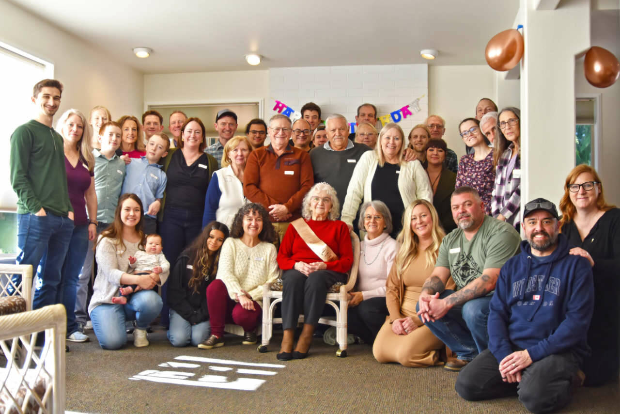 Sequim Gazette photos by Monica Berkseth
Donna Medlen, seated center in red sweater, is surrounded by family members who gathered in Sequim to celebrate her 98th birthday. Five generations are represented in this photo.