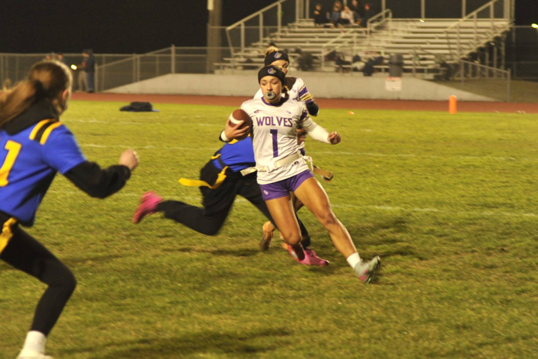 Sequim Gazette photo by Matthew Nash/ Ruby Moxley-Horgan weaves through Bremertons defense on Jan. 28 in Sequim. She scored multiple touchdowns in the win, including an opening score that was the length of the field.