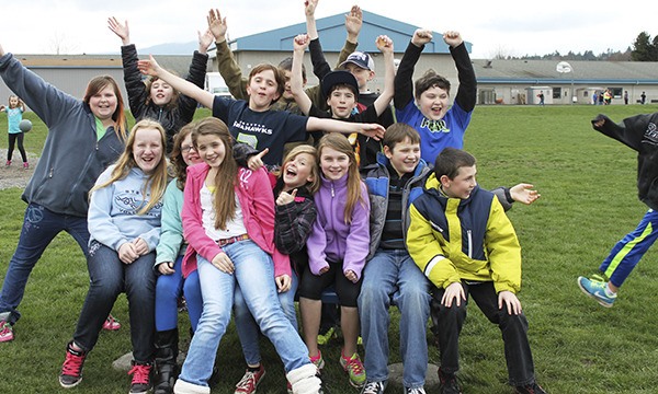 Greywolf Elementary School students enjoy the new buddy benches placed on the playground to encourage inclusion and new friendships.