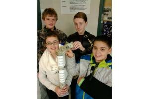 Middle school students pass the hat, donate funds