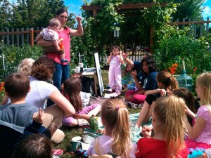 Port Angeles resident Christine Loewe leads “Growing Healthy Kids” at the Fifth Street Community Garden. In Growing Healthy Kids