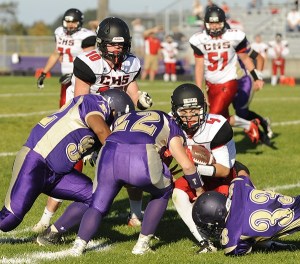 Sequim defenders (from left) Arnold Black