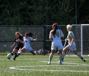 Peninsula College’s women take on Saint Martin’s College at the 2014 Rumble in the Rainforest.