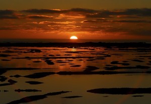 The sun sets over Walvis Bay.