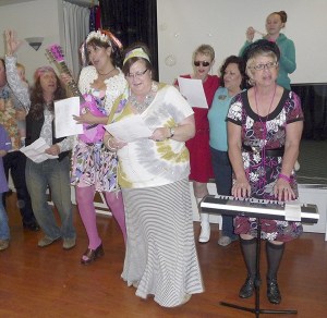 Chamber members and staff sang “Sequim is you and you are Sequim” to the tune of the Turtles’ “Happy Together” at the Crazy Daze Breakfast on May 2. From left are Brandino Gibson