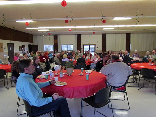 Volunteers for the City of  Sequim sit while being honored earlier this year in the Guy Cole Convention Center
