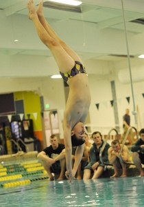 Sequim diver Mathew Craig earns Sequim’s lone first-place finish as the Wolves take on Olympic on Jan. 21 in Port Angeles.