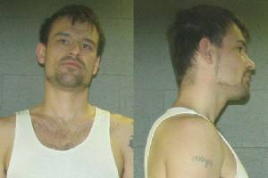 UPDATE 2: One suspect surrenders, one remains at large