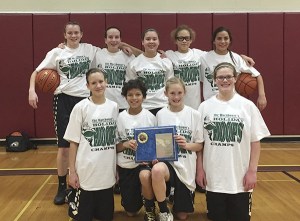 The Avalanche Black squad celebrates a division win in the 17th-annual Holiday Hoops Tournament in Port Angeles last weekend. Team members include (back row