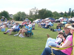Spectators enjoy a show at a Sequim Music in the Park event in 2014.