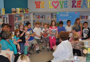 Teacher Patty Sullivan’s kindergarteners sing “If You’re Happy and You Know it