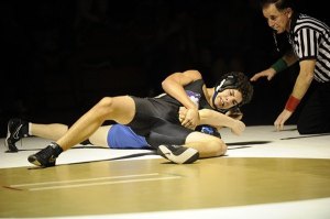 Sven Wiker works his way to pin Eugene Macero of North Mason.