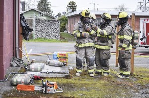 Recruits for Clallam County Fire District 3 prepare for training their firefighting and rescue techniques at the former Sequim City Hall building in March of 2014.