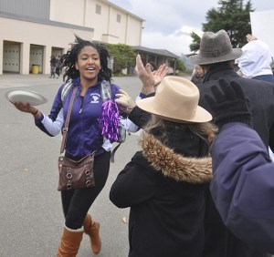 Sequim's Adrienne Haggerty gets well-wishes from SHS volleyball supporters on Nov. 12 as her team heads to the state 2A volleyball tournament in Lacey.
