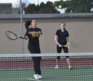 Cheyenne Sokkappa returns a serve in her win with doubles partner Heidi Stallman over Hannah Little and McKenna Thompson of Port Angeles.