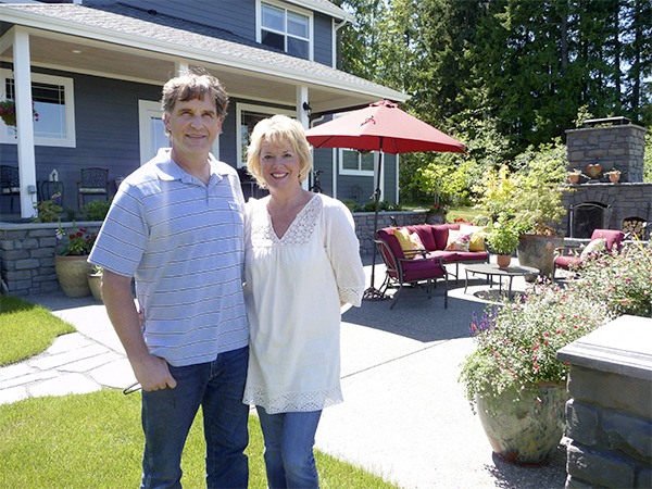 Chris and Yvonne Herr welcome guests to relax on their large outdoor patio with sweeping views of the Sequim-Dungeness Valley and Strait of Juan de Fuca.