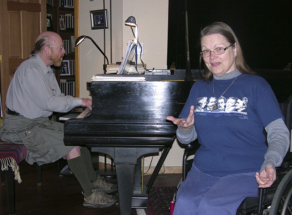 Professional musicians Steven and Kyra Humphrey give an impromptu performance in their  Sequim home. The two met when Steven accompanied Kyra’s voice lessons at the University of Washington.