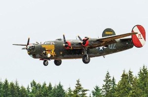 A B-24J Liberator makes a landing William R. Fairchild International Airport in Port Angeles as the Wings of Freedom tour begins on Wednesday